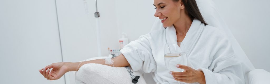 woman in white rob relaxing IV Therapy Chicago IL